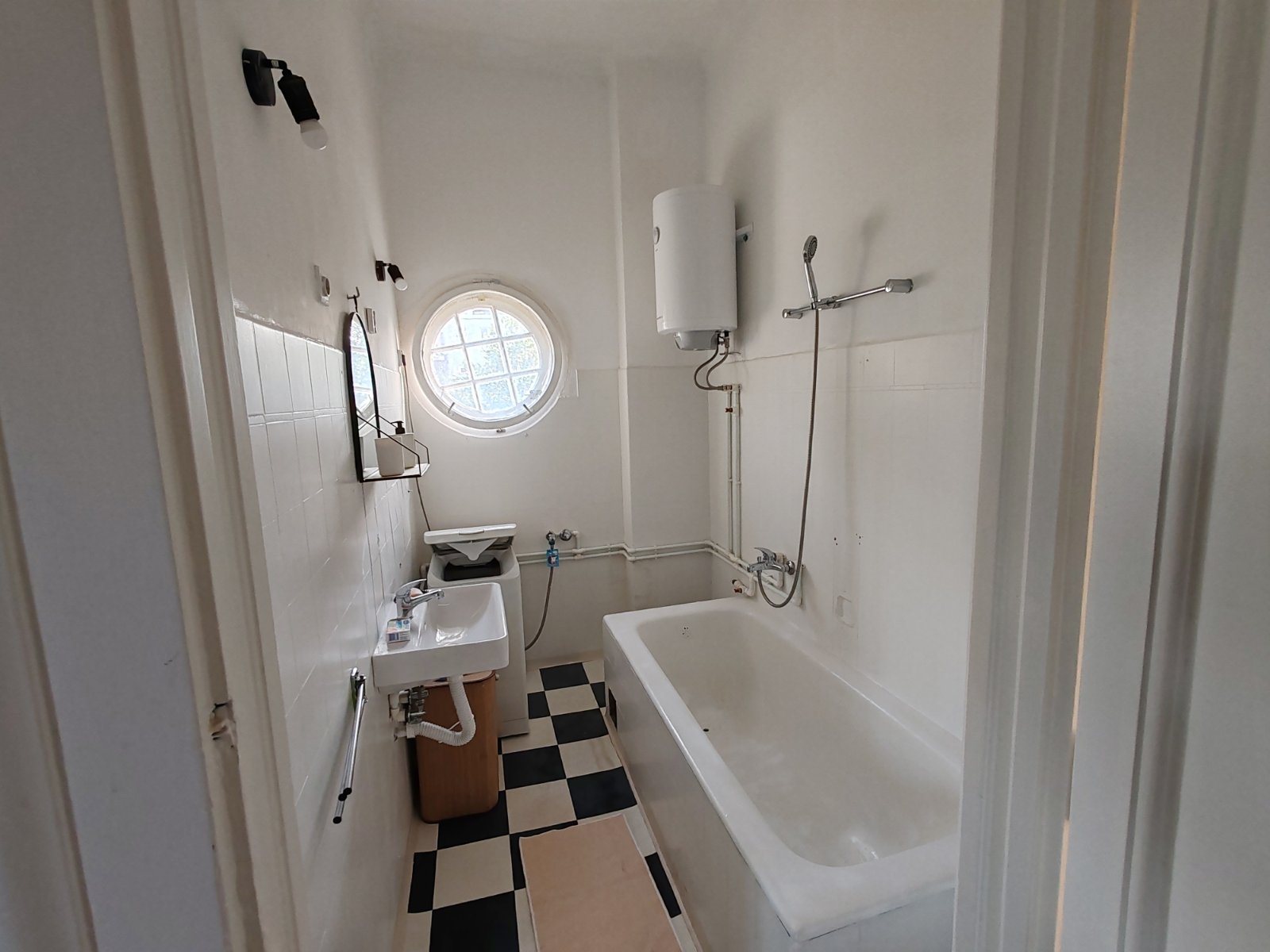 brick road with flowers on the side