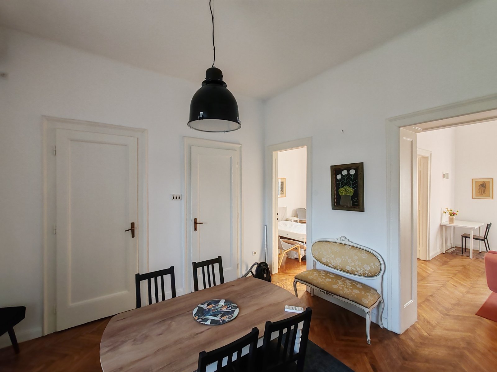 brick road with flowers on the side