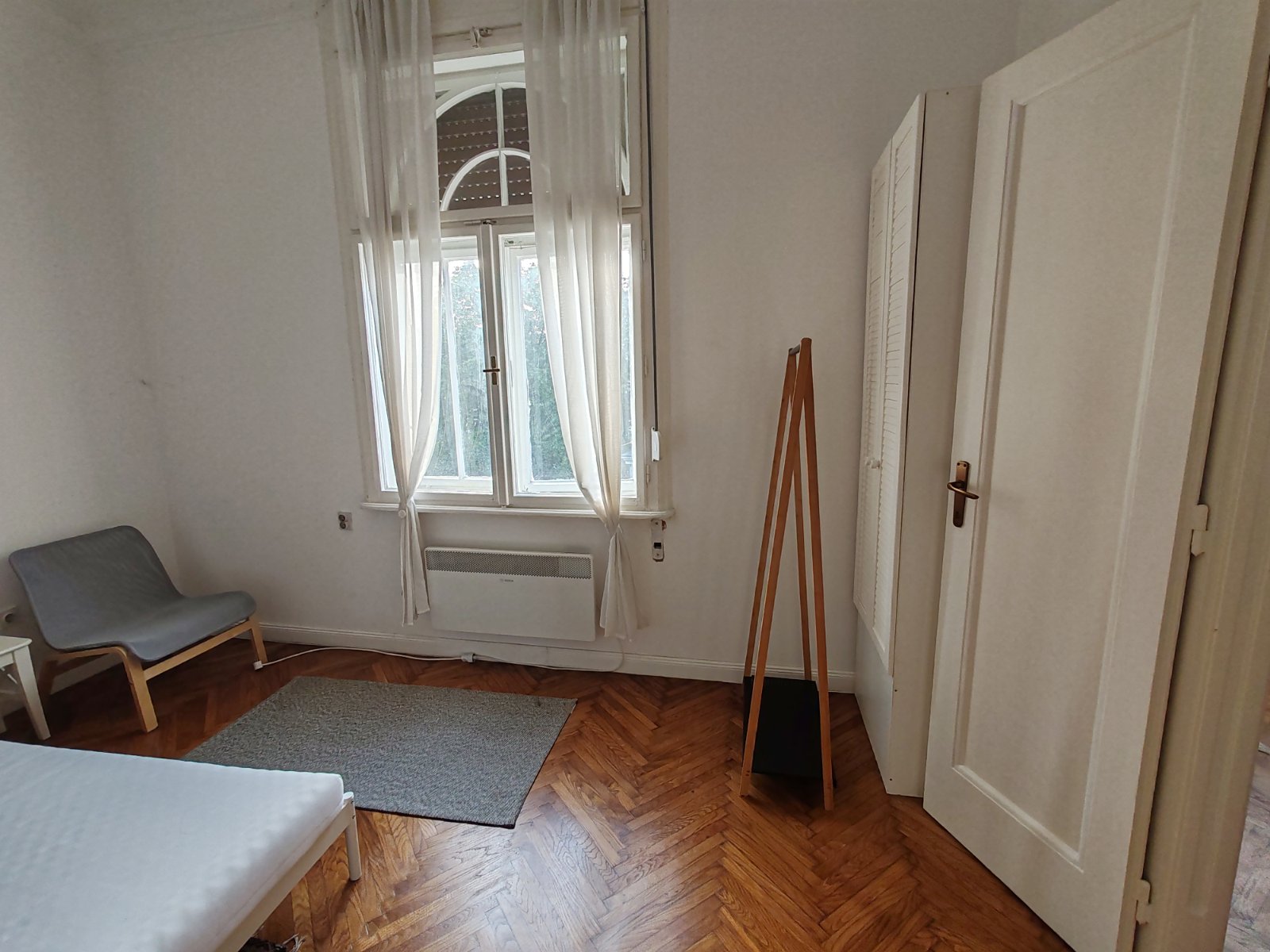 brick road with flowers on the side